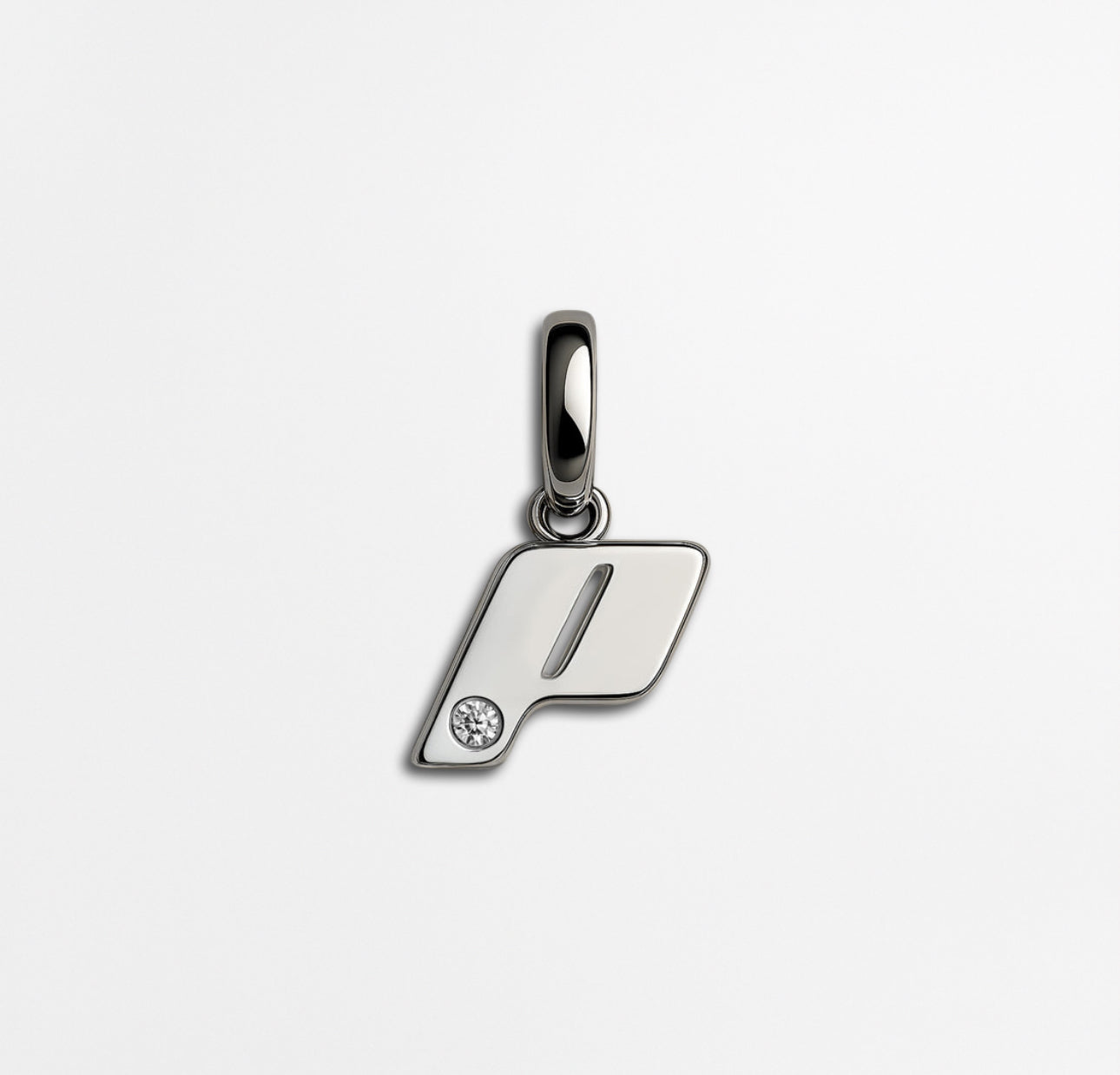 Single Play Drop earring in sterling silver with natural diamond, photographed on a soft neutral background.